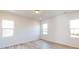 Bright bedroom with multiple windows allowing for plenty of natural light at 1817 Augustine St, Monroe, NC 28112