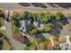 Aerial view of a property with a sparkling pool, lush landscaping, and a spacious backyard at 18823 Peninsula Cove Ln, Cornelius, NC 28031