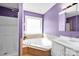 Bathroom featuring a jacuzzi-style tub, a shower and a white vanity with a mirrored medicine cabinet at 1924 Lakeview Dr, Rock Hill, SC 29732