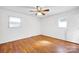 Bright bedroom features hardwood floors and windows for natural light creating a serene space at 1924 Lakeview Dr, Rock Hill, SC 29732