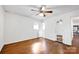 Bright bedroom features hardwood floors, mirror door, and windows for natural light creating a tranquil setting at 1924 Lakeview Dr, Rock Hill, SC 29732