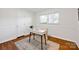 The bedroom has hardwood floors and white walls at 1924 Lakeview Dr, Rock Hill, SC 29732