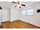 Bright bedroom featuring hardwood floors, closet, and windows for plenty of natural light, creating a cozy retreat at 1924 Lakeview Dr, Rock Hill, SC 29732