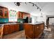 This well-appointed kitchen includes a large island with cooktop, stainless appliances and a breakfast nook at 1924 Lakeview Dr, Rock Hill, SC 29732