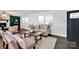 Cozy living room featuring neutral furniture, wood floors, and plenty of natural light at 1924 Lakeview Dr, Rock Hill, SC 29732