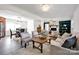 Open-concept living space with a dining area, comfortable seating, and dark wood floors at 1924 Lakeview Dr, Rock Hill, SC 29732