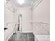 Walk-in closet has gray carpeted floors, white wire shelving, a full-length mirror and a white door at 1924 Lakeview Dr, Rock Hill, SC 29732