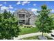 Inviting two-story home with a porch, balcony and a well-manicured lawn at 2015 Knocktree Dr, Indian Trail, NC 28079