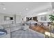 Spacious living room open to the kitchen, featuring hardwood floors and neutral decor at 2015 Knocktree Dr, Indian Trail, NC 28079