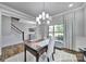 Elegant office featuring decorative trim work, natural light, and hardwood floors at 2015 Knocktree Dr, Indian Trail, NC 28079