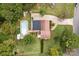 Aerial view of the backyard pool, deck, and surrounding greenery at 206 Cedarwood Dr, Salisbury, NC 28147