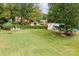 Expansive backyard with well-maintained lawn, ideal for outdoor activities and Gathering gatherings at 206 Cedarwood Dr, Salisbury, NC 28147