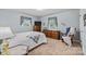 Comfortable bedroom featuring wooden furniture and soft natural light creating a welcoming and relaxing atmosphere at 206 Cedarwood Dr, Salisbury, NC 28147