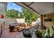 Outdoor deck features a hot tub, a seating area and lush landscaping creating a private retreat at 206 Cedarwood Dr, Salisbury, NC 28147
