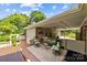 Spacious outdoor deck with ample seating and lush landscaping providing a comfortable space at 206 Cedarwood Dr, Salisbury, NC 28147
