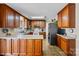 Spacious kitchen with ample cabinet space, stainless steel appliances, and tile flooring at 206 Cedarwood Dr, Salisbury, NC 28147