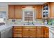Spacious kitchen with wooden cabinets, countertop space, and stainless steel appliances perfect for cooking at 206 Cedarwood Dr, Salisbury, NC 28147