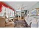 Comfortable living room with large windows, classic furniture, and a neutral decor at 206 Cedarwood Dr, Salisbury, NC 28147