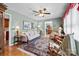 Cozy living room featuring a ceiling fan, area rug, and neutral color palette at 206 Cedarwood Dr, Salisbury, NC 28147