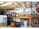 A basement featuring a work area, storage options, and well-lit space at 2124 Chatham Ave, Charlotte, NC 28205