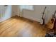 Bright bedroom featuring hardwood floors, natural light, and ample space for furnishings at 2124 Chatham Ave, Charlotte, NC 28205
