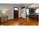 Inviting foyer with hardwood floors, an archway to the dining area, and a charming entryway table at 2124 Chatham Ave, Charlotte, NC 28205