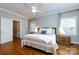 Cozy main bedroom with hardwood floors, ceiling fan, and ample natural light at 2124 Chatham Ave, Charlotte, NC 28205