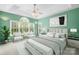 Serene bedroom with a large bed, ample natural light, and stylish decor at 229 River Birch Cir, Mooresville, NC 28115
