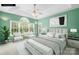 Serene bedroom with a large bed, ample natural light, and stylish decor at 229 River Birch Cir, Mooresville, NC 28115