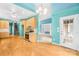 Open concept kitchen with hardwood floors and modern appliances with access to the deck at 229 River Birch Cir, Mooresville, NC 28115