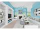 Bright living room featuring a fireplace, built-in shelves, large windows, and a comfortable seating area at 229 River Birch Cir, Mooresville, NC 28115