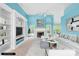 Bright living room featuring a fireplace, built-in shelves, large windows, and a comfortable seating area at 229 River Birch Cir, Mooresville, NC 28115