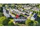 Expansive aerial view of townhome community featuring lush green landscaping and private back decks at 245 Rock Ridge Ln, Mount Holly, NC 28120