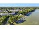 A sprawling waterfront property with a marina, community pool, and townhomes surrounded by lush foliage at 245 Rock Ridge Ln, Mount Holly, NC 28120