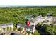 Stunning aerial shot of townhomes near a river, complete with community amenities and scenic views at 245 Rock Ridge Ln, Mount Holly, NC 28120
