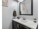 Modern bathroom featuring a sleek vanity, a stylish mirror, and elegant decor at 245 Rock Ridge Ln, Mount Holly, NC 28120