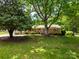 Charming brick ranch with a spacious front yard and mature shade trees at 2808 Findley Rd, Statesville, NC 28625