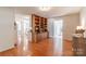 Spacious living area with hardwood floors, built in shelving, and neutral color palette at 2808 Findley Rd, Statesville, NC 28625