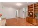 Bright living area featuring hardwood floors, built in shelving, and neutral color palette at 2808 Findley Rd, Statesville, NC 28625