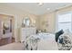 Comfortable bedroom with a queen bed, and artwork providing a serene and stylish space at 320 Basil Dr, Indian Trail, NC 28079
