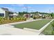 Manicured bocce ball court with lush landscaping; an inviting amenity for residents to enjoy at 320 Basil Dr, Indian Trail, NC 28079