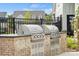 Outdoor stainless steel grills on a brick base at 320 Basil Dr, Indian Trail, NC 28079
