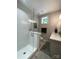 A bright bathroom featuring a glass enclosed shower with subway tile and neutral colors at 3201 Johnny Cake Ln, Charlotte, NC 28226