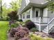 Landscaped exterior showcases beautiful gardens and inviting entrance at 3201 Johnny Cake Ln, Charlotte, NC 28226