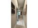 Bright hallway leading to a modern shower with glass enclosure and tile floors at 3201 Johnny Cake Ln, Charlotte, NC 28226