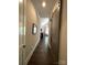 Inviting hallway showcasing hardwood floors and an open view to a spacious living area at 3201 Johnny Cake Ln, Charlotte, NC 28226