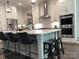 Modern kitchen with stainless steel appliances, a large island, and stylish lighting, perfect for cooking and entertaining at 3201 Johnny Cake Ln, Charlotte, NC 28226