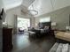 Spacious main bedroom suite featuring a tray ceiling, large window, and luxurious furnishings at 3201 Johnny Cake Ln, Charlotte, NC 28226
