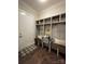 Mudroom with built-in storage, seating, and desk area at 3201 Johnny Cake Ln, Charlotte, NC 28226