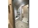 Spa-like shower featuring a glass enclosure, built-in bench, and designer tile at 3201 Johnny Cake Ln, Charlotte, NC 28226